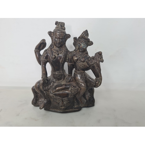 851 - An antique Tibetan Bronze of two Figures, 5in