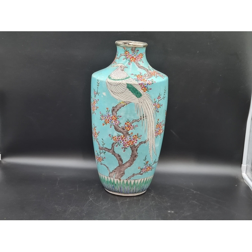 852 - A Chinese turquoise ground Vase painted exotic bird and flowering shrubs in colours, 17in, later sil... 