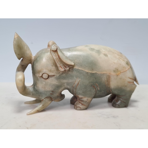 855 - A carved soapstone Figure of an Elephant, 4