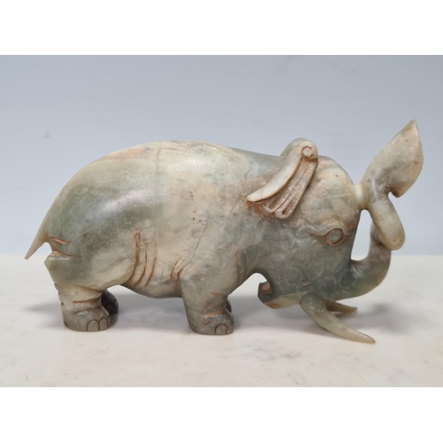 855 - A carved soapstone Figure of an Elephant, 4