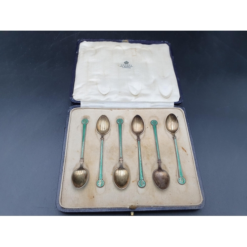 88 - Six George V continental silver-gilt and green enamel Coffee Spoons, import mark London 1931, in cas... 