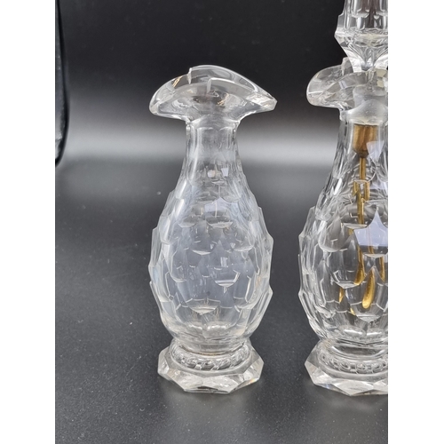 885 - Four early glass Condiment Bottles, two with Stoppers, having cut, fluted decoration