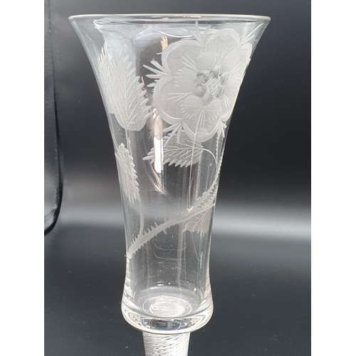 888 - A double opaque twist stem ratafia glass with slender flute engraved floral and leaf sprigs, base ch... 