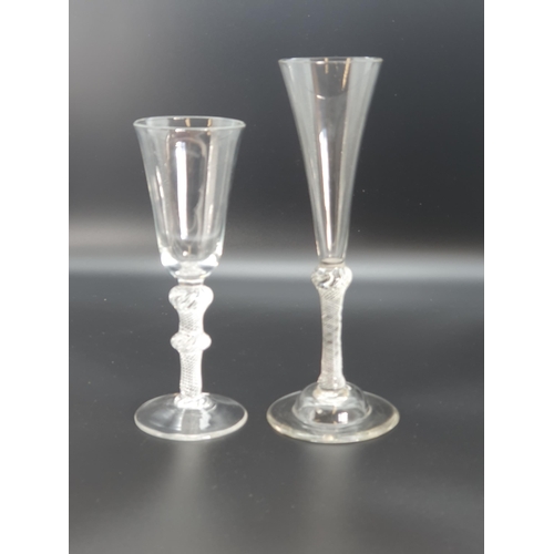 889 - A tall Wine Flute with single knop to the air twist stem, domed base with spreading frost, and anoth... 