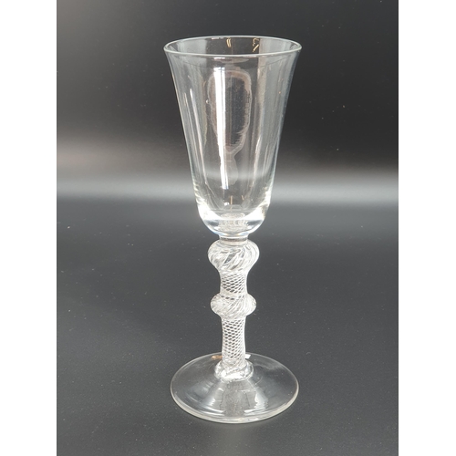 889 - A tall Wine Flute with single knop to the air twist stem, domed base with spreading frost, and anoth... 