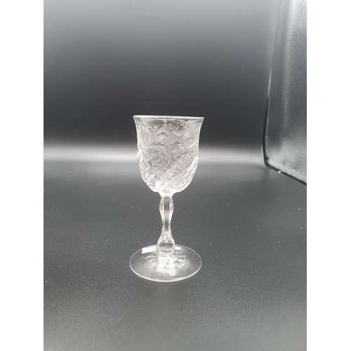 898 - A wine with trumpet bowl, tear drop stem, a small wine with fluted and floral engraved on baluster f... 