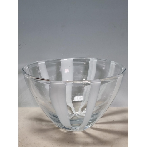 903 - Studio Glass to include, a black glass Candle Holder, an amethyst coloured glass shallow Bowl, 11.5