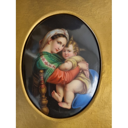 908 - A framed oval Porcelain Panel painted The Madonna della Seggiola after Rafaello, Sanzio called Rapha... 