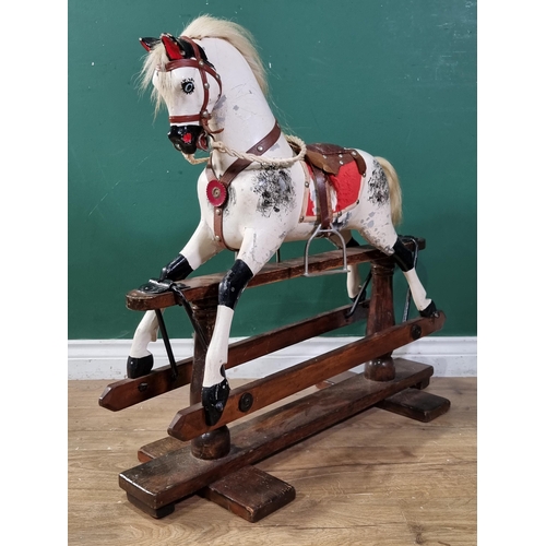 922 - An antique carved wooden Rocking Horse of small proportions, 29