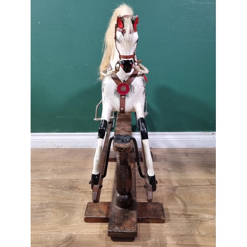 922 - An antique carved wooden Rocking Horse of small proportions, 29