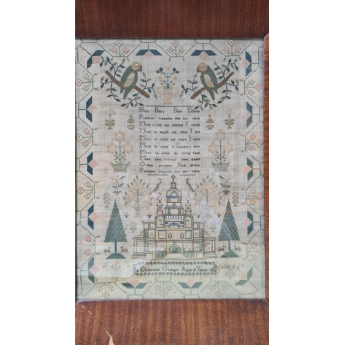 923 - An early 19th century needlework Sampler by Elizabeth Grainger aged 11 years with verse, temple, par... 