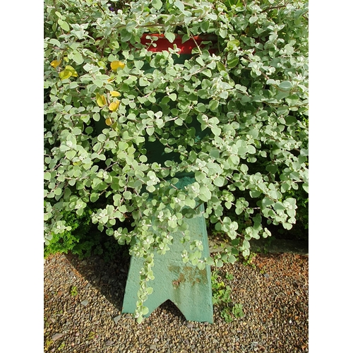 970 - A pair of large green painted cast iron Boilers, (Planters) on associated stands, 4ft high overall