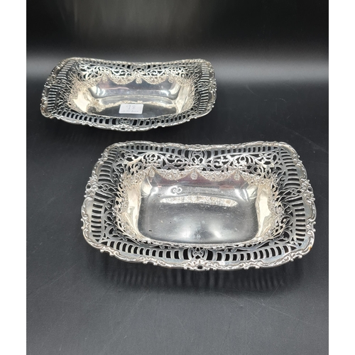 98 - A near pair of Victorian silver pierced oblong Baskets with swag design, Chester 1897 and Birmingham... 