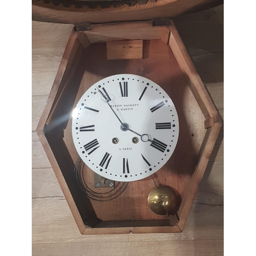 514 - A 19th Century French Wall Clock, oval with applied carved mounts, the circular dial inscribed 'Mart... 