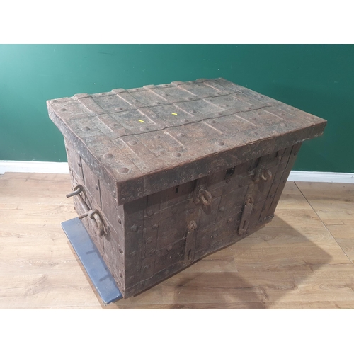 835 - A 17th Century iron bound Armada Chest with three locks, two clasps and rivetted strapping 3ft 8in W... 