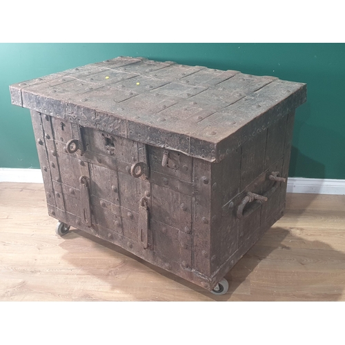 835 - A 17th Century iron bound Armada Chest with three locks, two clasps and rivetted strapping 3ft 8in W... 