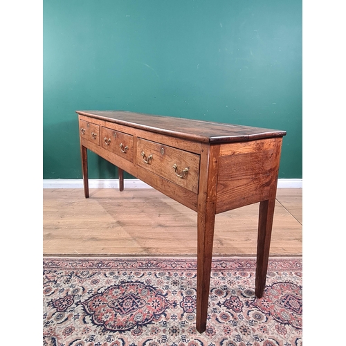 576 - An antique oak Dresser Base fitted three frieze drawers on squared tapering supports, 6ft W x 2ft 9i... 