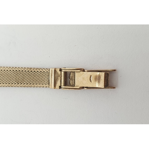 121 - A lady's Limit Wristwatch the gold dial with hourly baton markers, case width approx 15mm on 9ct gol... 