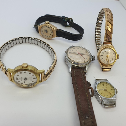 149 - A lady's Smiths Astral Wristwatch in 9ct gold case and four other Watches