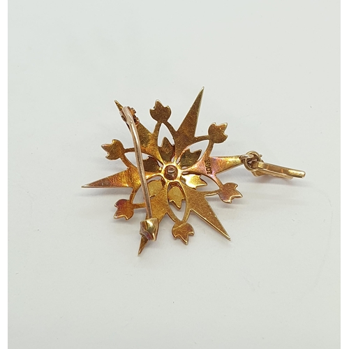 163 - A Victorian Seed Pearl Star Pendant/Brooch, stamped 15ct, approx 32mm diameter, approx 6.30gms