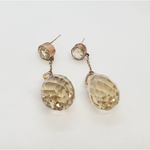 175 - A pair of Citrine Ear Pendants set large briolette-cut stones suspended below mixed-cut round stones... 