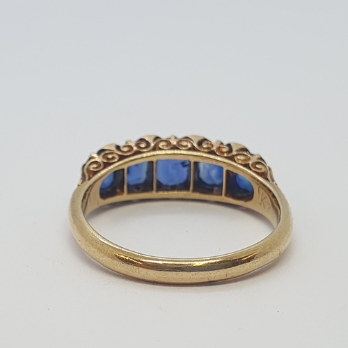 177 - A Victorian five stone Sapphire Ring by Mappin & Webb claw-set graduated oval mixed cut stones of fi... 