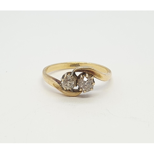 179 - A Diamond two stone crossover Ring claw-set old-cut stones, stamped 18ct, ring size M, approx 2.70gm... 