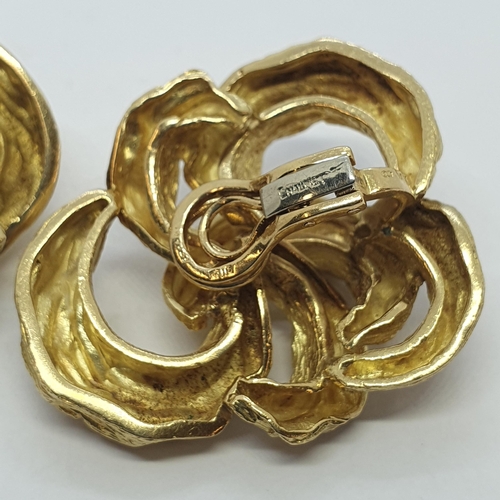 180 - A pair of Chaumet Ear Clips each formed as a textured knot in 18ct gold, approx 4cms long, approx 48... 