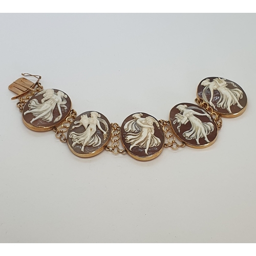 183 - A carved Shell Cameo Link Bracelet comprising five panels depicting the 'Five Muses' in 14ct gold, s... 