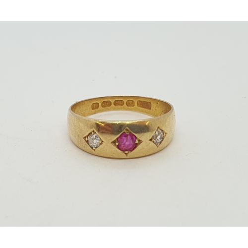 185 - An early 20th century Ruby and Diamond Ring, gypsy-set cushion-cut ruby between old-cut diamonds in ... 