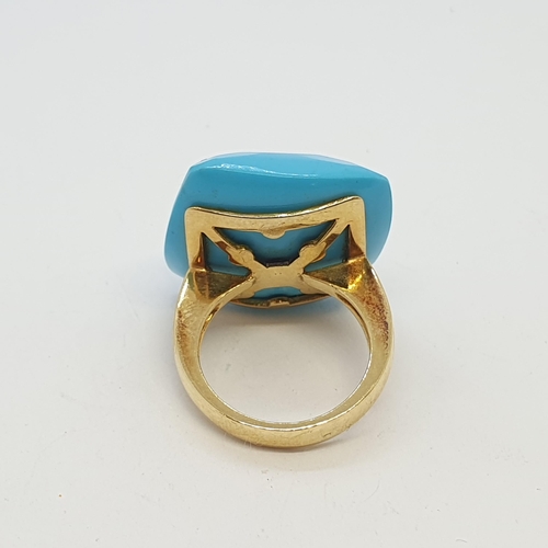 187 - A large Turquoise Cocktail Ring set faceted cabochon turquoise (re-constituted?) - approx 28mm2, sta... 