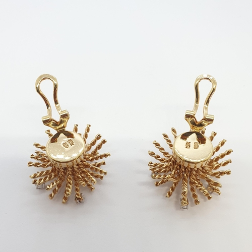 192 - A Pair of Diamond Starburst Ear Clips each claw-set six brilliant-cut stones in 18ct gold, approx 25... 