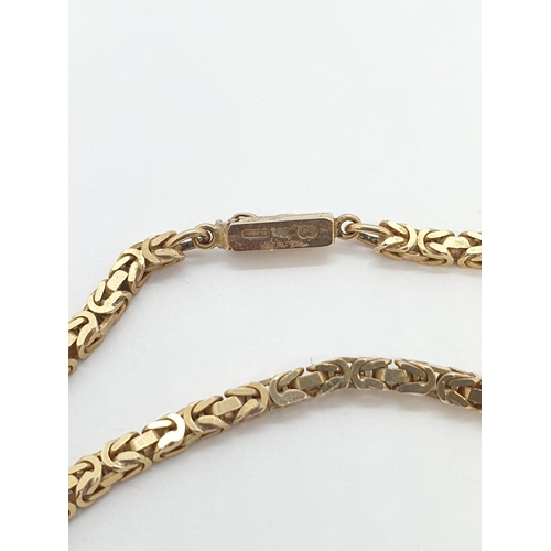 202 - A 9ct gold Byzantine Chain, approx 70cms long, approx 38.60gms