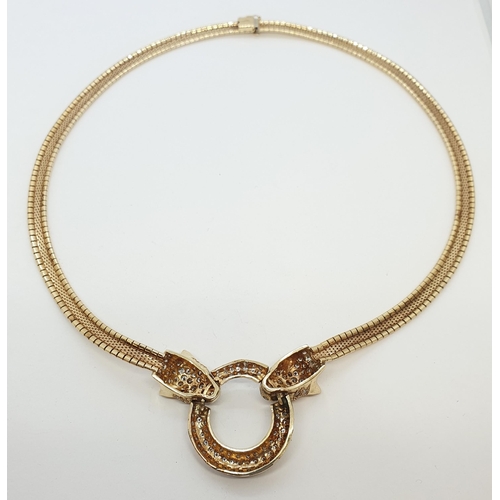 226 - A Diamond Necklace with Leopard Head terminals holding hoop, all pavé-set brilliant-cut diamonds on ... 