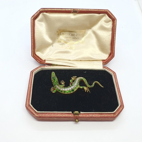 234 - A French gem-set Salamander Brooch with ruby eyes, a row of graduated old-cut diamonds pavé-set to b... 