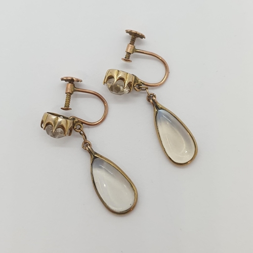 241 - A pair of Moonstone drop Earrings each claw-set round paste suspending moonstone cabochon, on screw ... 