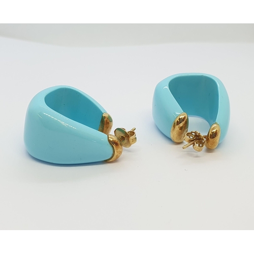 255 - A pair of turquoise coloured Vintage Resin Earrings mounted on yellow gold fittings and posts, no ha... 