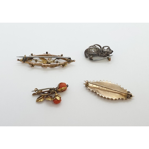 261 - Two 9ct gold Victorian Brooches set seed pearls and red stones, approx 5.10gms, a spray Brooch set c... 