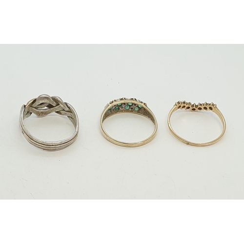 272 - A collection of three Rings including a v-shaped diamond illusion-set ring in 9ct gold, ring size S1... 