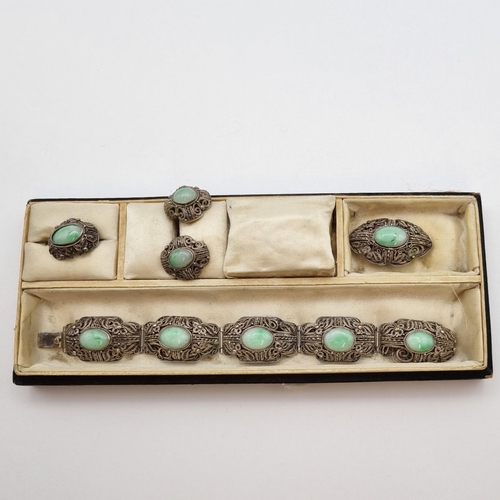 269 - A Silver Filigree and Jade Parure comprising panel bracelet, earrings, brooch and ring (A/F), approx... 