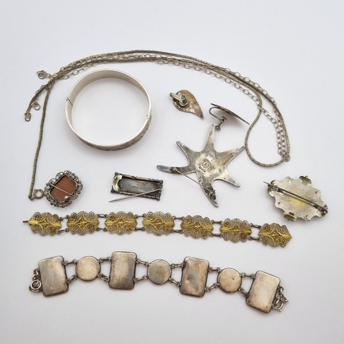 277 - A Collection of silver and white metal Jewellery including; hinged Bangle, filigree Bracelet, variou... 