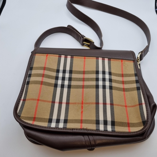 299 - A Burberry satchel style Handbag in 'Burberry' check with brown leather, adjustable shoulder strap, ... 