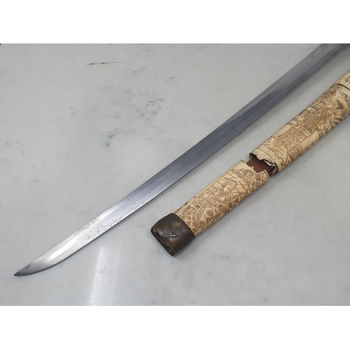 1078 - An antique Japanese Wakizashi with carved bone grip and scabbard A/F 25 1/2in L overall and a Kukri ... 