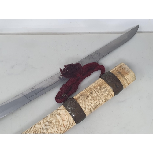 1078 - An antique Japanese Wakizashi with carved bone grip and scabbard A/F 25 1/2in L overall and a Kukri ... 