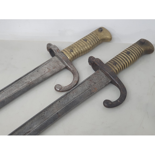 1080 - Two 1876 Pattern Chasse Pot Bayonets stamped 'W1370' and 'X79094'