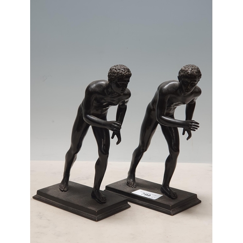 799 - Two similar bronze Figures of nude male runners, 8 1/2in H