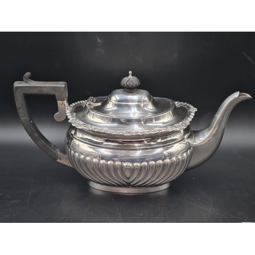 119 - An Edward VII silver three piece Tea Service of boat shape with gadroon embossing, Chester 1902/3, 1... 