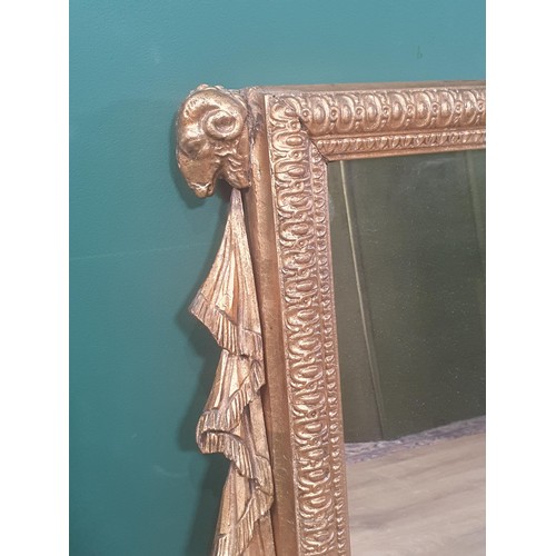 660 - A 19th Century gilt Overmantel Mirror with raised centre decorated swags, having border design and w... 