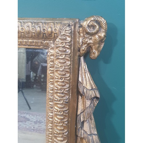 660 - A 19th Century gilt Overmantel Mirror with raised centre decorated swags, having border design and w... 