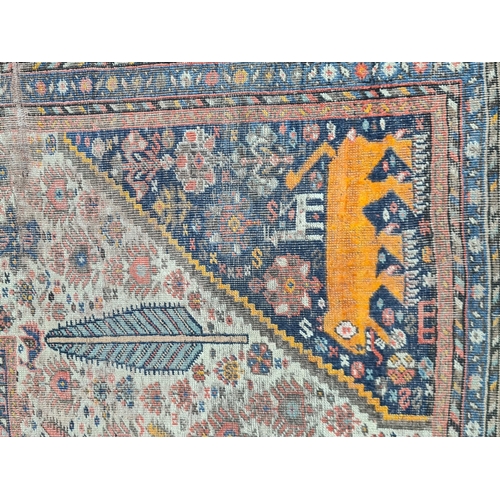 936 - A multi-bordered Shirvan Rug with central field of trees and birds, spandrels with mustard tigers, 1... 